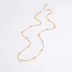 Close-up of gold-plated S925 silver beaded choker with adjustable chain and clasp