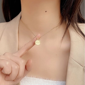 Golden 925 sterling silver necklace with a round pendant engraved with ALL IS WELL text