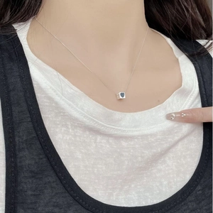 Minimalist S925 sterling silver necklace with black heart cube pendant on model