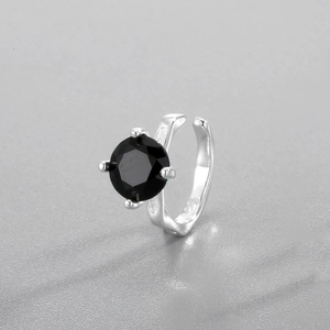 Detail of S925 sterling silver ear cuff with black zircon and four-prong setting