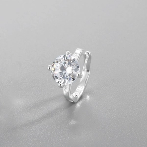 Close-up of S925 sterling silver ring featuring a four-prong set sparkling zircon stone