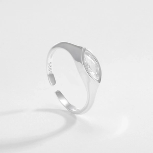 Macro detail of S925 sterling silver ring band with marquise cubic zirconia inlay