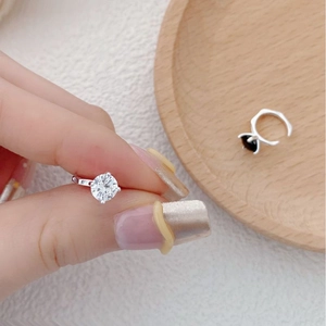 Detailed macro view of S925 silver ring featuring a sparkling four-prong set cubic zirconia