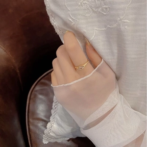 Elegant gold S925 silver ring featuring marquise-cut zircon on model hand with lace
