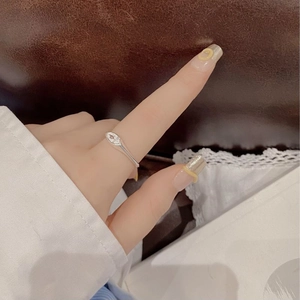 Close-up of S925 sterling silver ring with marquise zircon on model's hand