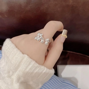 Elegant S925 sterling silver grape bead cluster open ring shown on a hand with knitwear