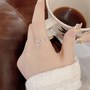 Minimalist S925 sterling silver double-layer chain ring shown on hand in lifestyle setting