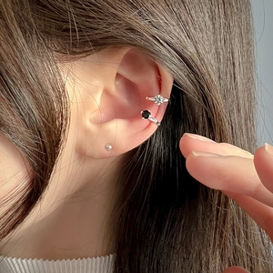 Detail showing S925 sterling silver ear cuffs with cubic zirconia and mini ball stud