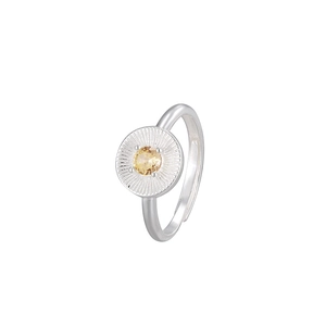 Minimalist S925 silver ring featuring a round yellow zircon stone with an adjustable band