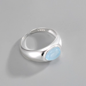 Close-up of S925 sterling silver ring featuring oval light blue aquamarine gemstone