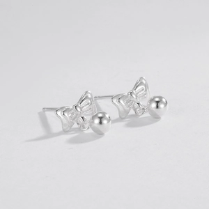 Close-up of S925 sterling silver bow knot earrings with polished spherical beads