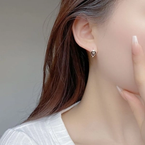 S925 sterling silver hoop earrings with black heart pendant and silver bow detail