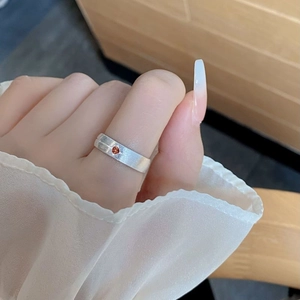 Vintage S925 sterling silver brushed ring with orange-red starburst gemstone