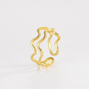 Close-up of triple-layered wavy golden open ring with minimalist polished surface