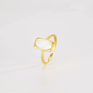 Detailed view of S925 sterling silver stamp on the adjustable white shell ring band