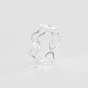 Detailed close-up of double-layer wave sterling silver ring with adjustable opening