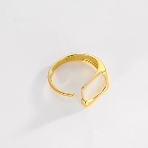 Detailed close-up of S925 silver stamp and shell inlay on adjustable gold ring