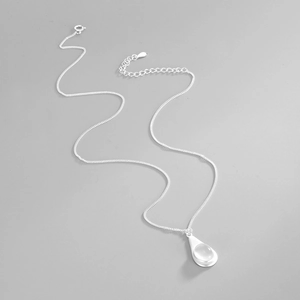Detail of S925 sterling silver chain with droplet pendant and lobster clasp closure