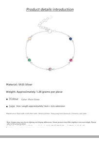 Macro detail of S925 sterling silver bracelet with five round rainbow colored gemstones
