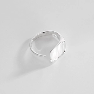 Close-up of S925 sterling silver stamp on minimalist adjustable punk ring band