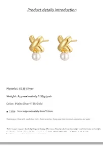 Macro detail of French vintage S925 silver pearl stud earrings with 18K gold coating