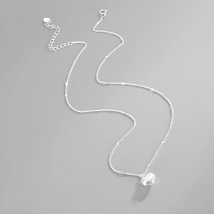 Detailed shot of S925 sterling silver brushed heart pendant with lobster clasp and chain