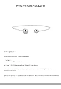 Macro detail of S925 sterling silver twisted bangle with smooth beads and 48mm size