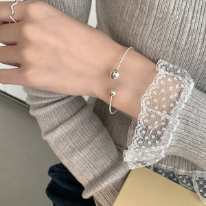 Minimalist S925 sterling silver beaded cuff bracelet and wave ring set on model