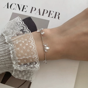 Elegant S925 sterling silver chain bracelet with shimmering water-drop cubic zirconia stones