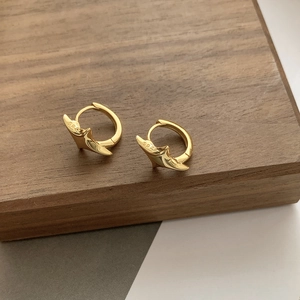 Minimalist 925 sterling silver hoop earrings with a gold finish and star-shaped charms