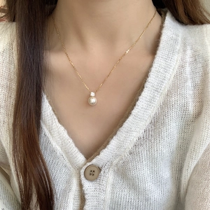 Elegant S925 sterling silver pearl pendant necklace on a gold chain for women