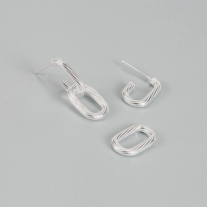 Retro S925 sterling silver knot stud earrings with textured finish and modular design