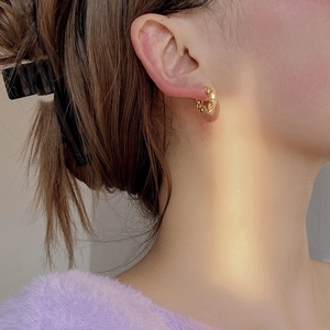 Minimalist gold S925 silver hoop earrings with irregular hammered metal texture for women