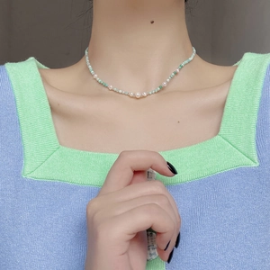 Baroque pearl and amazonite S925 silver beaded necklace shown on a female model neck