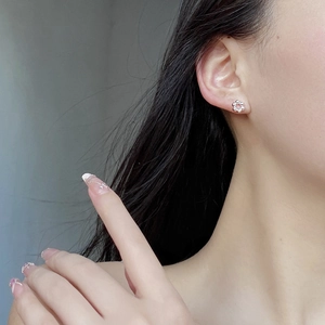 Minimalist 925 sterling silver ball cluster stud earrings shown on model