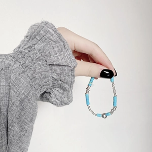 S925 sterling silver beaded bracelet with turquoise stones and a polished silver bead