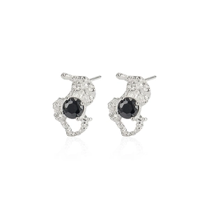 Irregular textured S925 silver earrings with round black zircon inlay on white background
