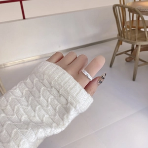 S925 sterling silver wheat grain twisted open ring worn on finger in daily setting