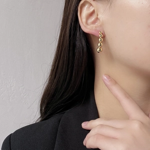 Elegant 925 sterling silver drop earrings with five graduated golden metal beads