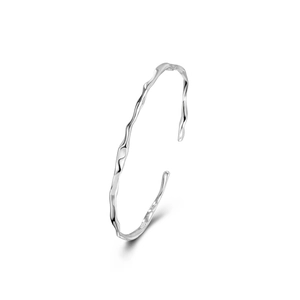 Minimalist S925 sterling silver open bangle featuring irregular wavy texture design