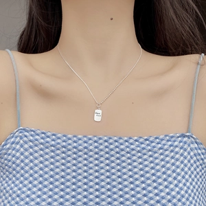 S925 sterling silver Good Luck rectangle pendant necklace with beaded chain on model