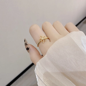 Minimalist gold S925 sterling silver hollow flower ring with an adjustable open design