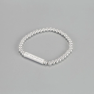 Bracciale minimalista con perline in argento S925 e ciondolo inciso Lucky da donna