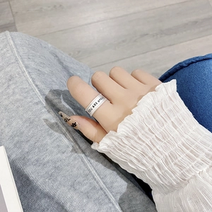 Adjustable 925 silver ring with You Are Enough engraving and braided edge textures