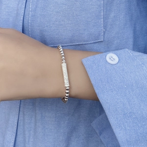 Bracciale minimalista con perline in argento S925 e targhetta in metallo scritta Lucky
