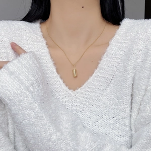 Elegant gold S925 sterling silver necklace with minimalist cylinder lock pendant