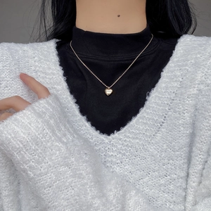 Elegant gold heart pendant necklace engraved with Moment on minimalist silver chain