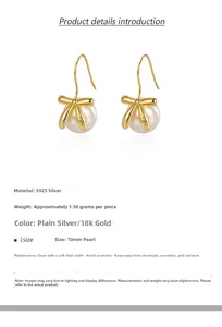 Macro shot of 18k gold S925 silver bow earrings with 10mm glossy shell pearls