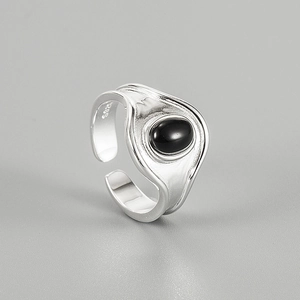 Minimalist 925 sterling silver ring featuring a black oval onyx stone in a sleek design