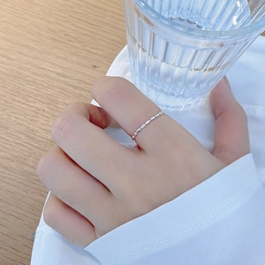 Minimalist S925 sterling silver chain ring with adjustable design on female finger